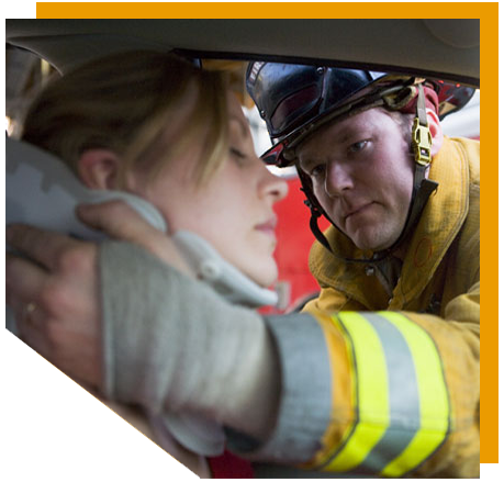 Firefighters helping an injured woman in San Antonio, TX car accident